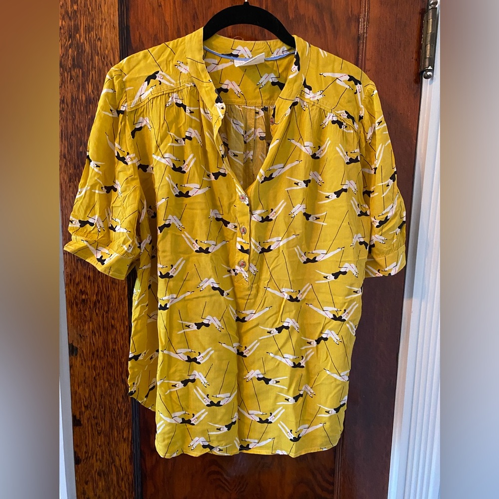 Anthropologie top with whimsical trapeze artists